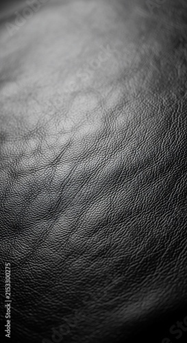 Textured Darkness: A Close-Up Study in Shadow and Grain