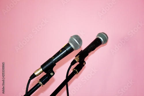 A microphone on a stand. A microphone for singers, hosts, and narrators a microphone for on-stage events.