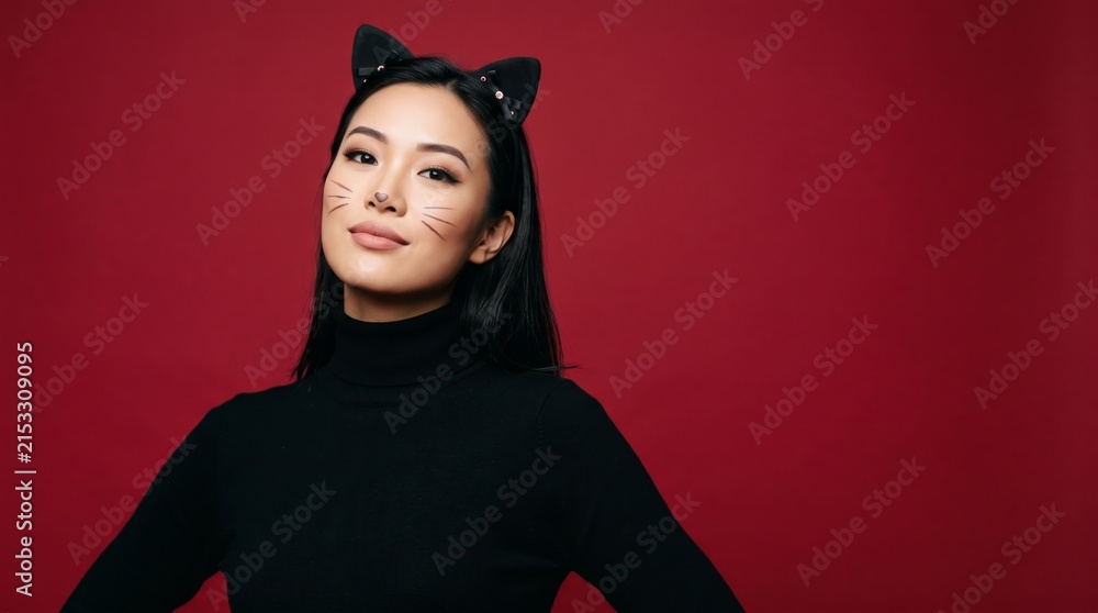 Fototapeta premium woman wearing a cat ears headband