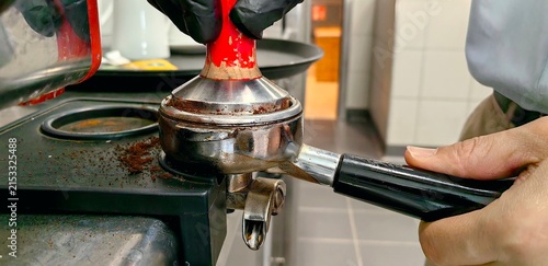 Принти на полотні The tamping process is a stage of pressing the coffee grounds in the portafilter using a tamper before being extracted into espresso using a coffee machine