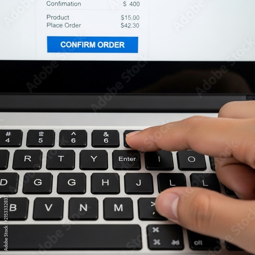 Digital transaction completion, decisive click on the keyboard.