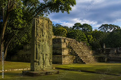 Carved stela at Copán Maya site, ancient civilization and history concept