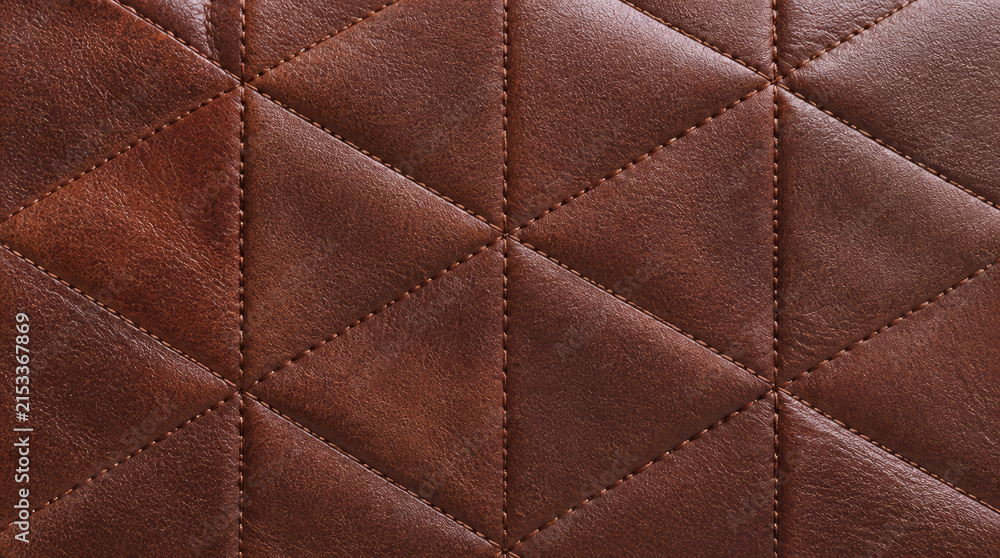 Naklejka premium Quilted leather surface with geometric sections, showcasing fine grain and rich topaz color, evokes sense of luxury and craftsmanship