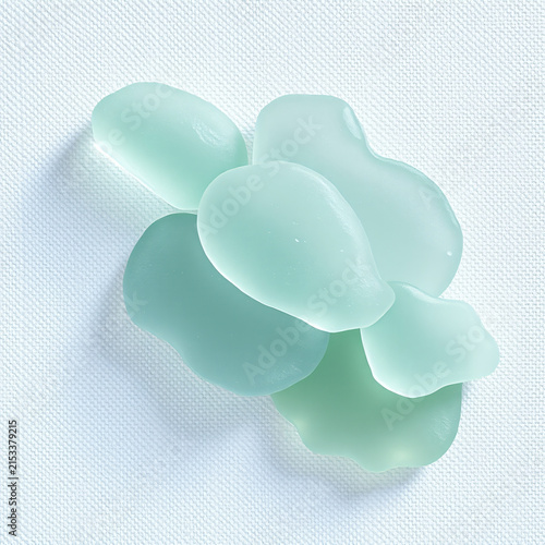 Translucent sea glass layers pale green blue white