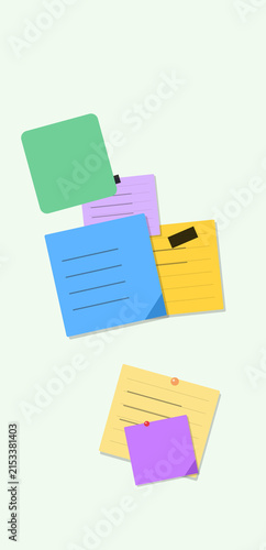 Colorful sticky notes and paper arranged creatively
