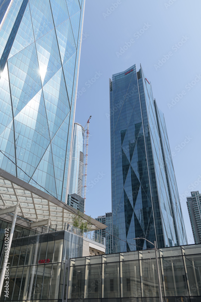 Fototapeta premium CIBC Square, global operational headquarters for the Canadian Imperial Bank of Commerce, designed by WilkinsonEyre, Adamson Associates, located at 81 and 141 Bay St, Toronto