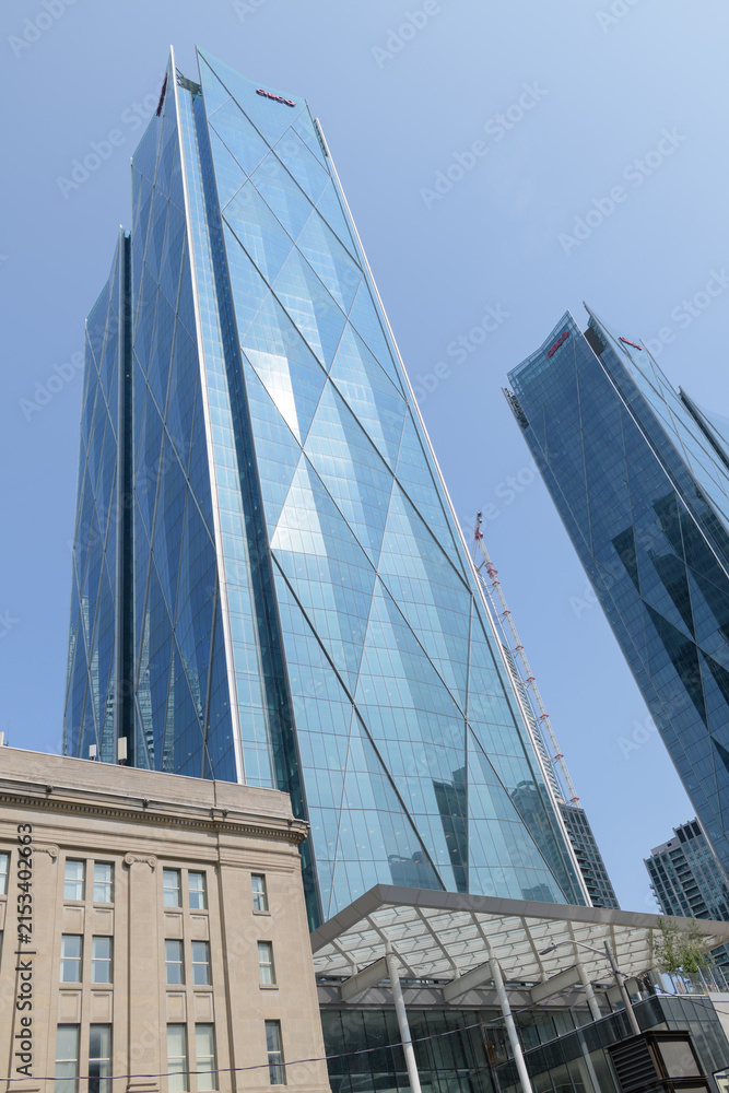 Fototapeta premium CIBC Square, global operational headquarters for the Canadian Imperial Bank of Commerce, designed by WilkinsonEyre, Adamson Associates, located at 81 and 141 Bay St, Toronto
