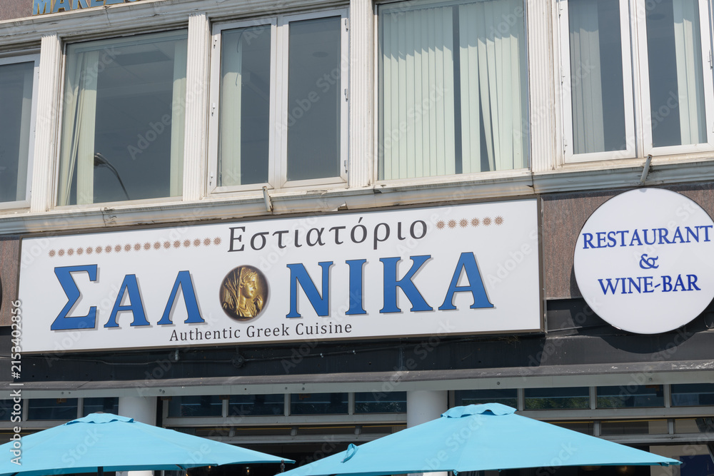 Fototapeta premium exterior building and sign of Salonika Estiatorio, a Greek restaurant, located at 402 Danforth Av, Toronto