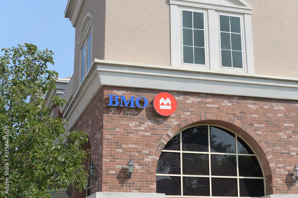 Fototapeta premium exterior building facade and sign of BMO Bank of Montreal at 147 Laird Dr, SmartCentres, East York, Toronto