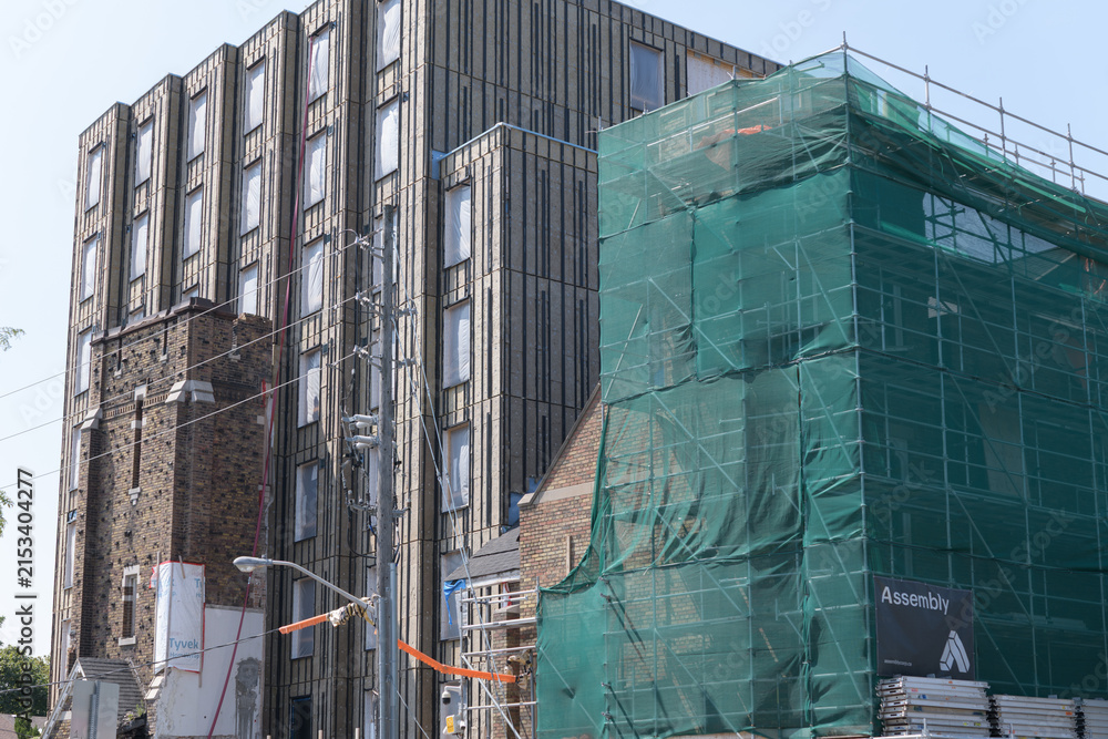 Fototapeta premium former Danforth Church being incorporated into a housing development at 60 Bowden St and Danforth Av, Toronto