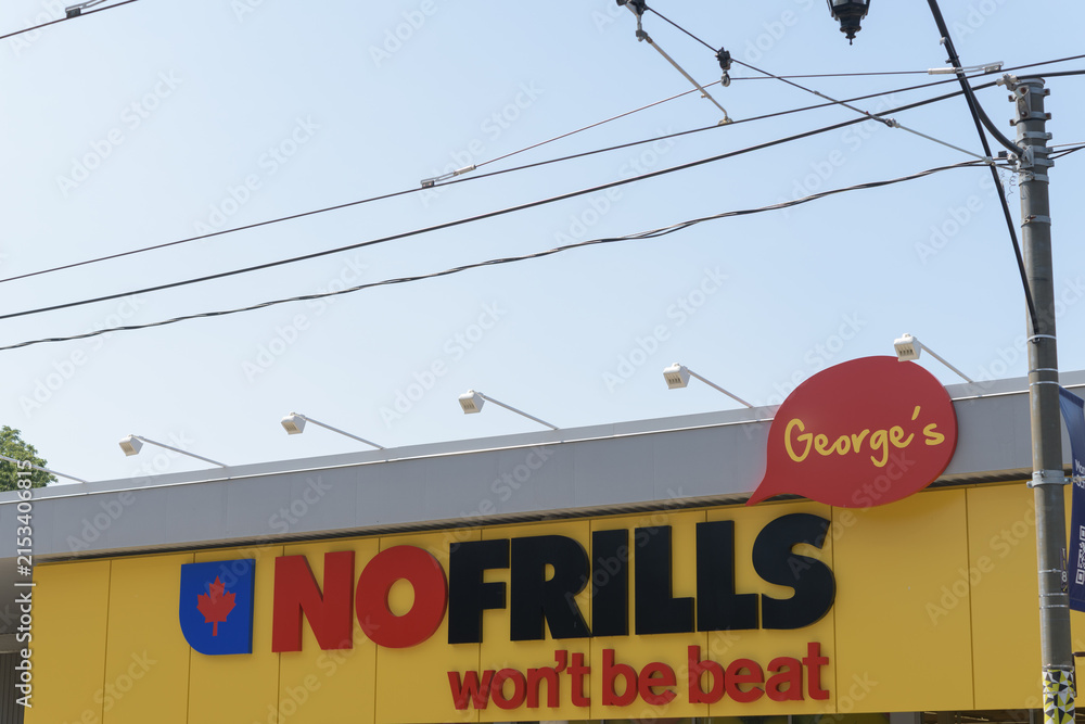 Fototapeta premium exterior building facade and sign of George's NOFRILLS, a grocery store chain, located at 720 Broadview Av, Toronto