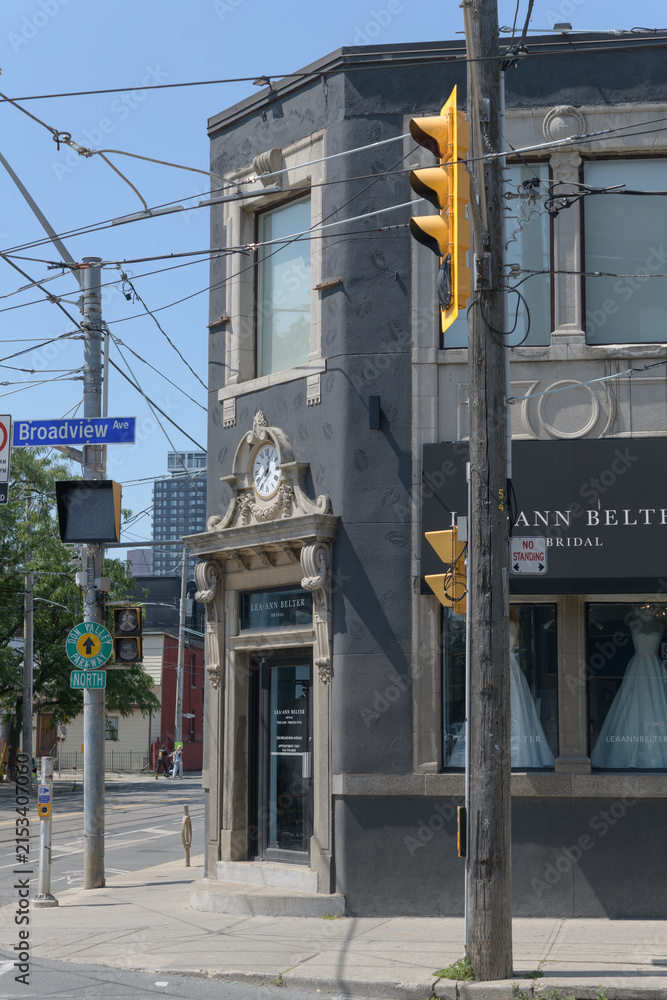 Fototapeta premium exterior building facade and sign of Lea-Ann Belter Bridal located at 238 Broadview Av, Toronto
