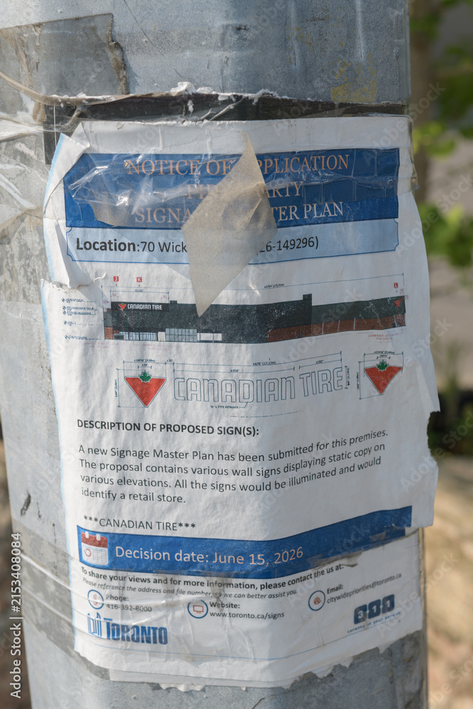 Fototapeta premium required 'notice of application' poster in Toronto (Canadian Tire sign)