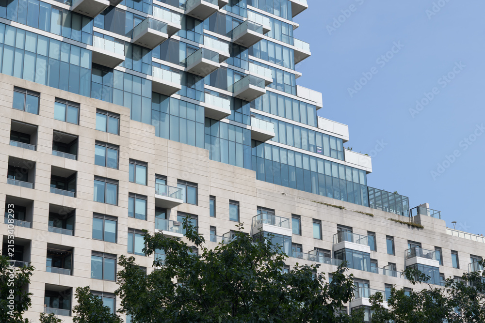 Fototapeta premium detail of west elevation of Monde Condominiums, designed by Moshe Safdie (with Quadrangle Architects) located at 12 Bonnycastle St, Toronto