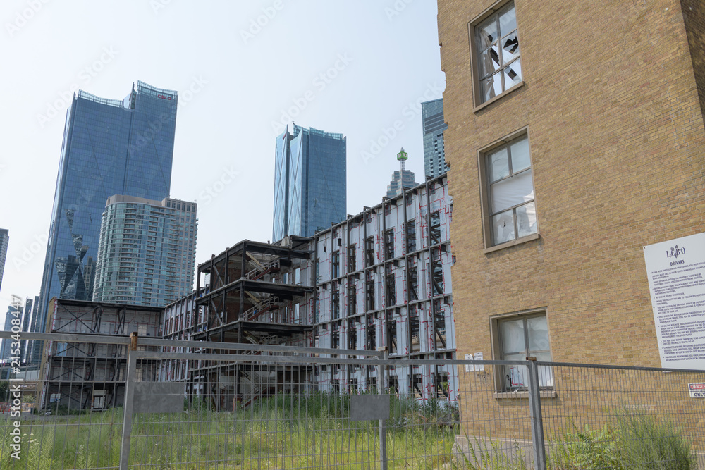 Fototapeta premium looking northwest from edge of old LCBO headquarters and warehouse at 55 Lake Shore Boulevard East, to buildings in the downtown core, Toronto