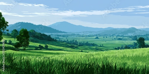 Panoramic view of a green landscape with rolling hills mountains and blue sky