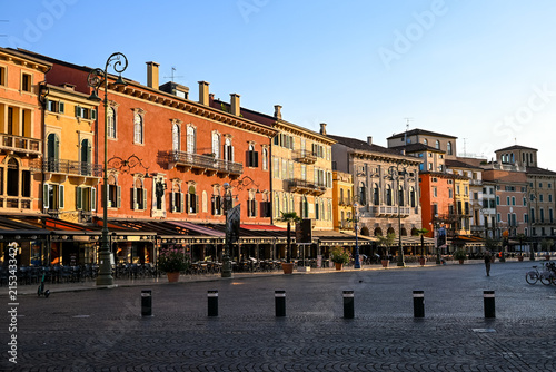 Historic Piazza Bra in Verona illuminated by morning sunlight