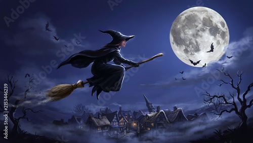 A witch flying on a broomstick over a small village at night under a large full moon with bats and dark clouds in a spooky halloween scene