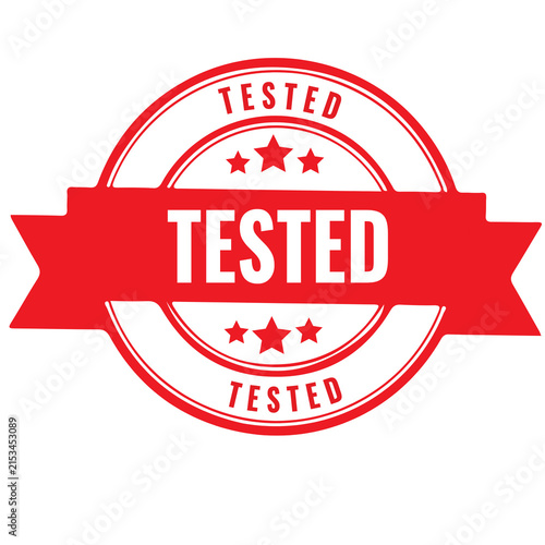 Red tested stamp sign with grunge texture
