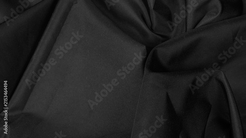 Fotografie black textile canvas with complex draped folds