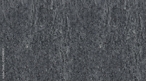 Close-up view of rough asphalt surface showing granular texture and weathered appearance in natural outdoor setting