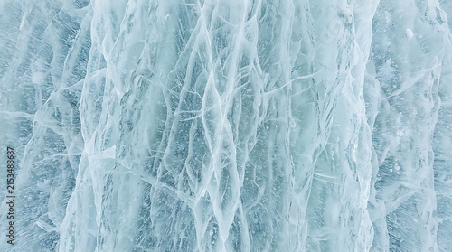 Majestic icy formation with intricate crystalline structures reflecting cold winter landscapes and frozen water textures