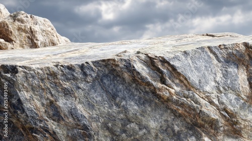 Craggy Mountain Rock Texture Under Cloudy Sky