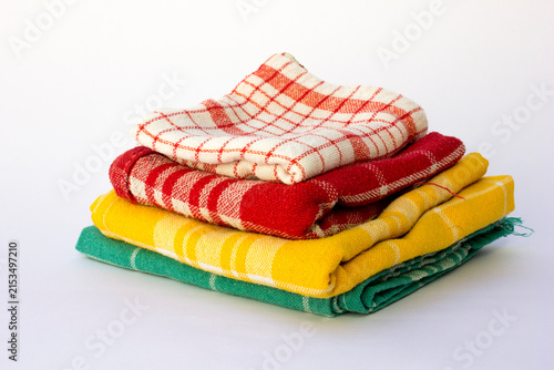 Obraz na płótnie Stack of colorful plaid kitchen towels on white background