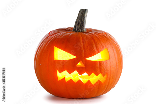 Group of spooky Halloween pumpkins with glowing faces
