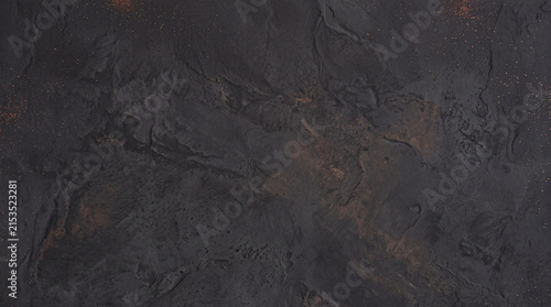 Charcoal Mineral Surface with Warm Bronze Oxidation