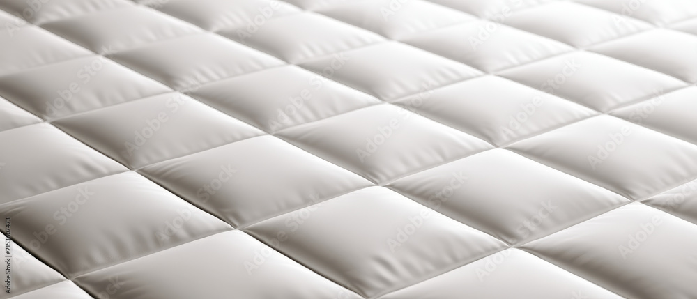 Naklejka premium White Quilted Surface with Soft Diamond Cushion Pattern