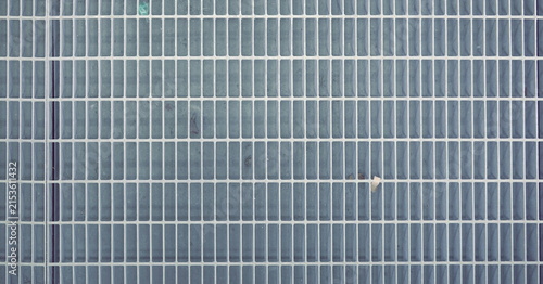 Canvastavla Industrial Metal Grating Surface With Repetitive Geometric Grid Pattern