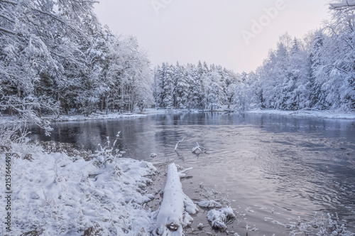 River landscape with snow and frostin Farnebofjarden national park in north of Sweden