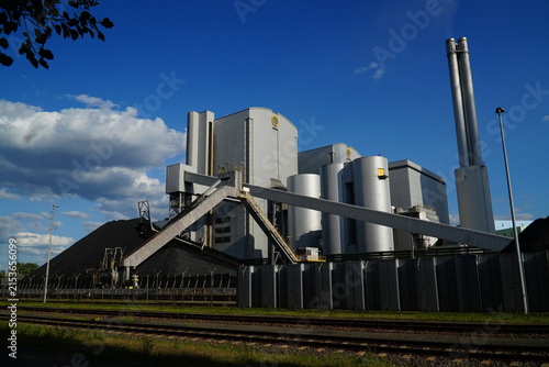 Coal fired power plant with stone coal dump in Hanover Stoecken, Lower Saxony, Germany. An old technology that is partly responsible for global warming. 