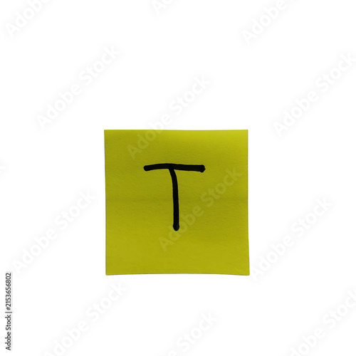 Black lowercase letter t on bright yellow sticky note isolated on transparent background