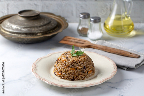 Obraz na płótnie Traditional Turkish Spiced Rice İç Pilav with Currants and Pine Nuts