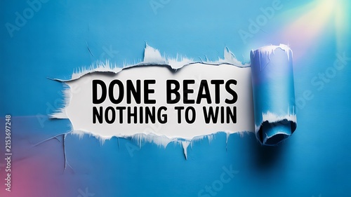 A blue torn paper revealing motivational quote text done beats nothing to win