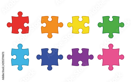 Quadro su tela Colorful jigsaw puzzle pieces arranged on a white background