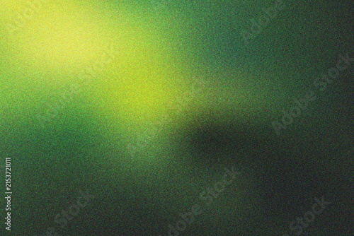 Fotografie Abstract grain texture featuring soft glowing light and vibrant yellow and green