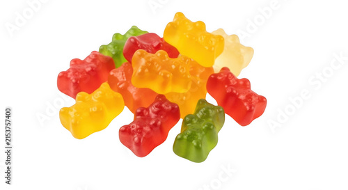 Colorful gummy bear candies piled together with selective focus during bright studio lighting isolated on transparent background
