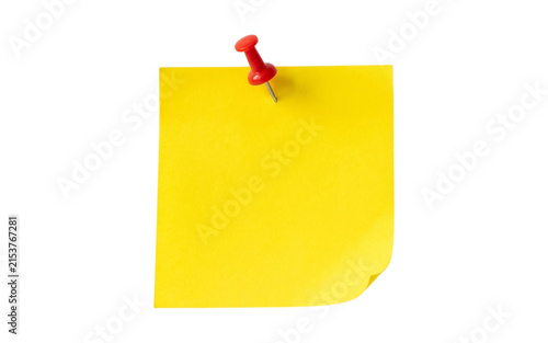 Fotografie Yellow square sticky note pinned with red pushpin for reminders and office task organization