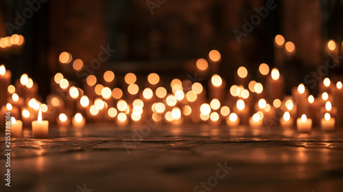 Warm Candle Lights Glowing in Dark Interior with Bokeh Background