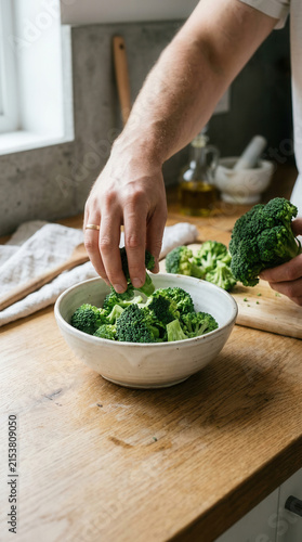 Fresh Broccoli Being Prepared In A Bright Kitchen Setting