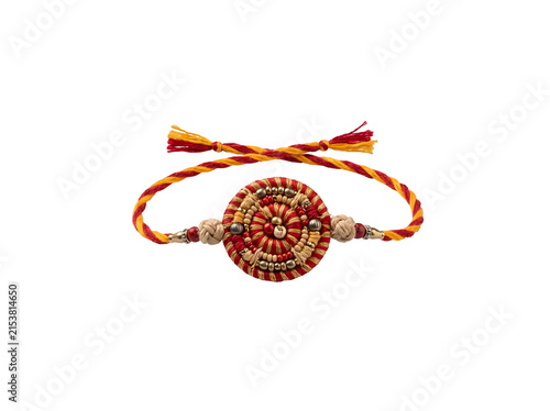 Traditional Indian Raksha Bandhan rakhi bracelet with red and golden threads, handcrafted beads and decorative centerpiece isolated as a transparent PNG design element.