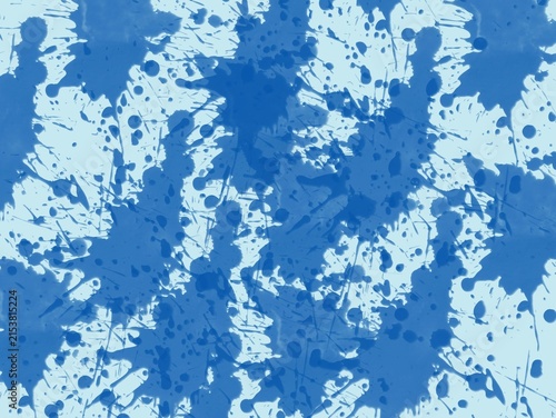 фотографія Blue paint splatters scattered randomly across a light blue background