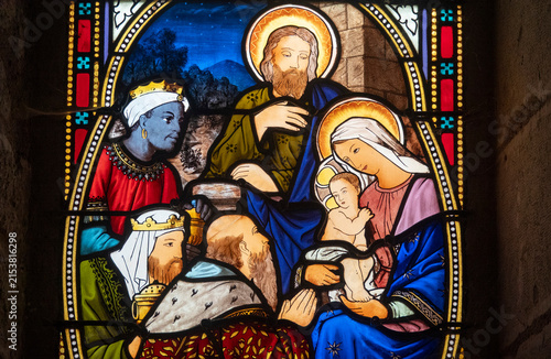 Obraz na płótnie Stained glass (19th century) of Christmas Nativity Scene : Adoration of the Magi as they present gifts of gold, frankincense and myrrh to the Infant Jesus