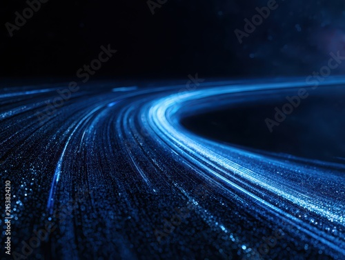 Abstract background of flowing blue fiber optic light trails, representing highspeed data transfer and digital network infrastructure