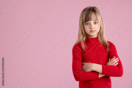 Cuadro en lienzo Portrait of cute little girl on pink background. Space for text