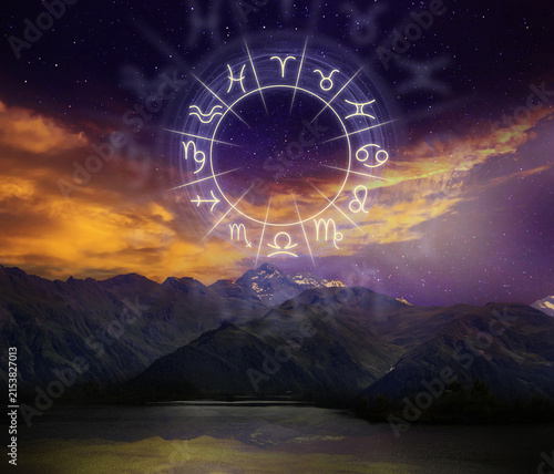 Astrological zodiac wheel. Illustration on starry sky above mountains at night