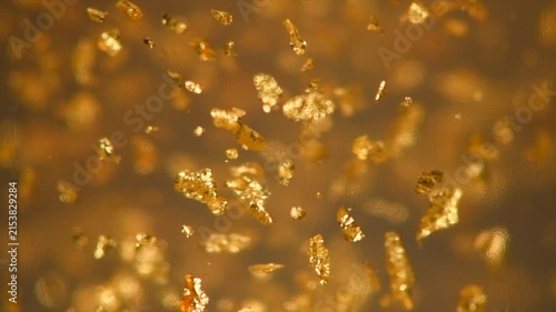 Luxury transparent cream gel with sparkling 24k gold floating particles serum, beauty products, wellness ads, cosmetic presentations. Skin care, face creme, mask, body lotion, moisturizer, fluid 